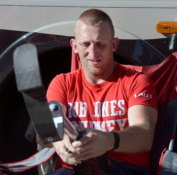 Al Hartmann | The Salt Lake Tribune)
Rob Jones, a retired Marine Corps Sergeant who lost both legs when he stepped on an improvised explosive device in Afghanistan, attaches his prosthetic legs to run a marathon, (26.2) miles in Liberty Park in Salt Lake City Wednesday Oct. 25. He won a Bronze Medal in the Paralympics and he wis the first and only double above the knee amputee to ride a normal bicycle 5,180 miles across America. Now, he is set to run 31 marathons in 31 days in 31 major cities. Starting in London on October 12th, and continuing in the United States and Toronto, he will run 26.2 miles in the selected city on his own, travel to the next city, and repeat, ending appropriately on Veterans Day in our Nation’s Capital. His motto, “Survive. Recover. Live.”