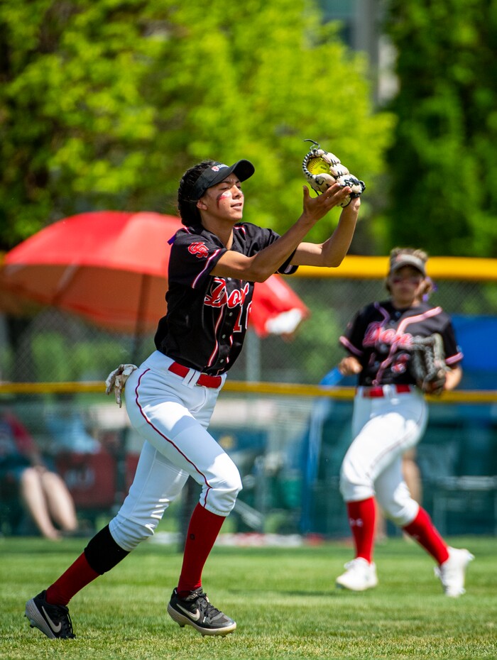 (Isaac Hale | Special to The Tribune) Spanish Fork outfielder Peyton Hall (14) makes a catch during the second game of a best-of-three series between the Spanish Fork Lady Dons and the Mountain Ridge Sentinels as part of the 5A state softball championship held at the Spanish Fork Sports Park on Friday, May 28, 2021.