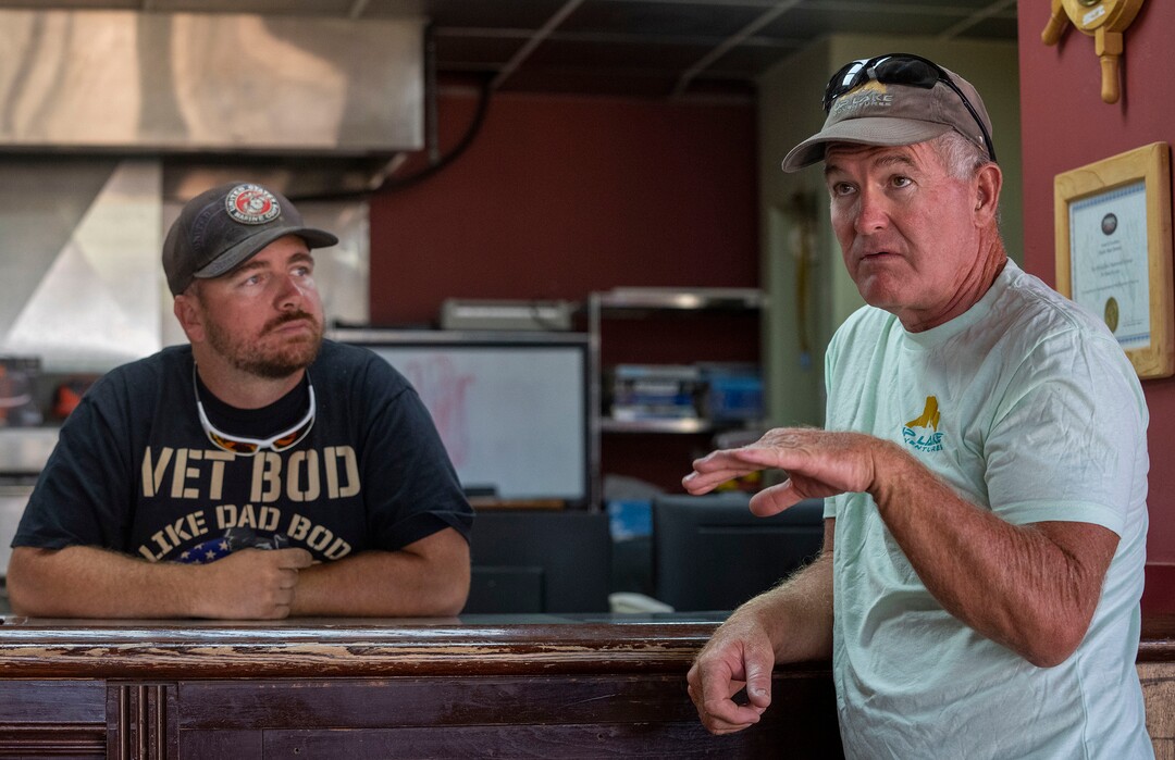 (Rick Egan | The Salt Lake Tribune) Big Water business owners, Robert Wilkes, listens to Bob Reed, as they discuss the problems with the low water level and the boat ramps, at Lake Powell, on Tuesday, Aug. 3, 2021.