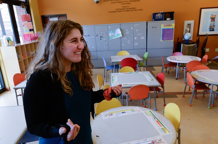 (Francisco Kjolseth | The Salt Lake Tribune) Annie Struder, marketing and communications manager for the YWCA give a tour of the after school room at the Center for Women & Familes in Salt Lake on Tuesday, March 20, 2018. State officials are encouraging people to donate money on their tax forms to help the homeless through the Pamela Atkinson Homeless Trust Fund.