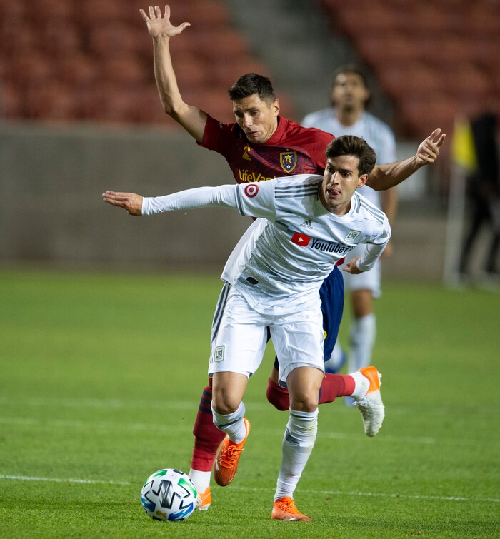 (Rick Egan  |  The Salt Lake Tribune).  Los Angeles FC midfielder Francisco Ginella (8) brings the ball downfield as Real Salt Lake midfielder Damir Kreilach (8) defends, in MLS soccer action between Real Salt Lake and Los Angeles FC at Rio Tinto Stadium, on Wednesday, Sept. 9, 2020.


