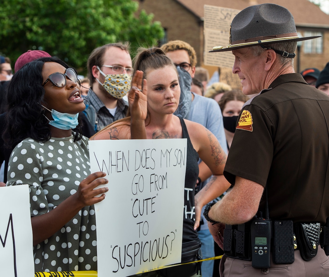 (Rick Egan  |  The Salt Lake Tribune) Ayugi Ntambwe-Kalala and Michelle Rockelle talk to Utah Highway Patrol Major Michael Rapich in front of the State Capitol, during a George Floyd demonstration in Salt Lake City on Thursday, June 4, 2020.