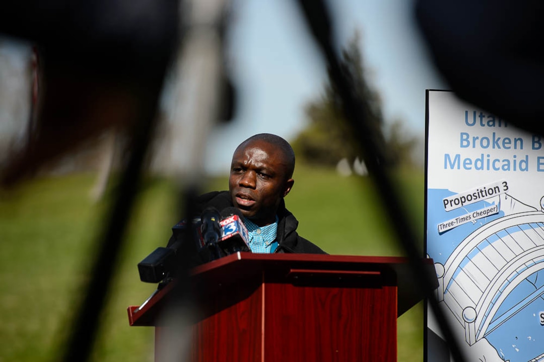(Trent Nelson | The Salt Lake Tribune)  Leonard Bagalwa talks about Utah's "bridge" Medicaid expansion program at a news conference in Salt Lake City's Liberty Park on Monday April 1, 2019.