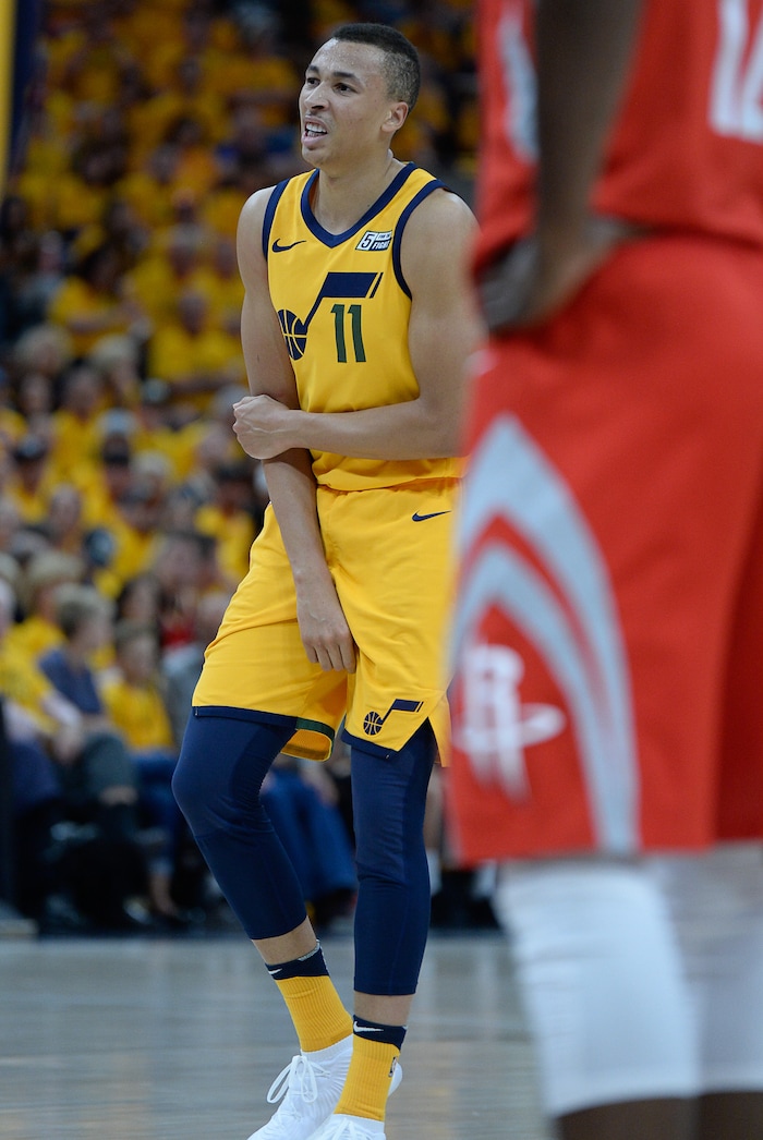 (Francisco Kjolseth | The Salt Lake Tribune) Dante Exum holds his elbow after taking a tumble against the Houston Rockets in Game 4 of the NBA playoffs at the Vivint Smart Home Arena Sunday, May 6, 2018 in Salt Lake City.