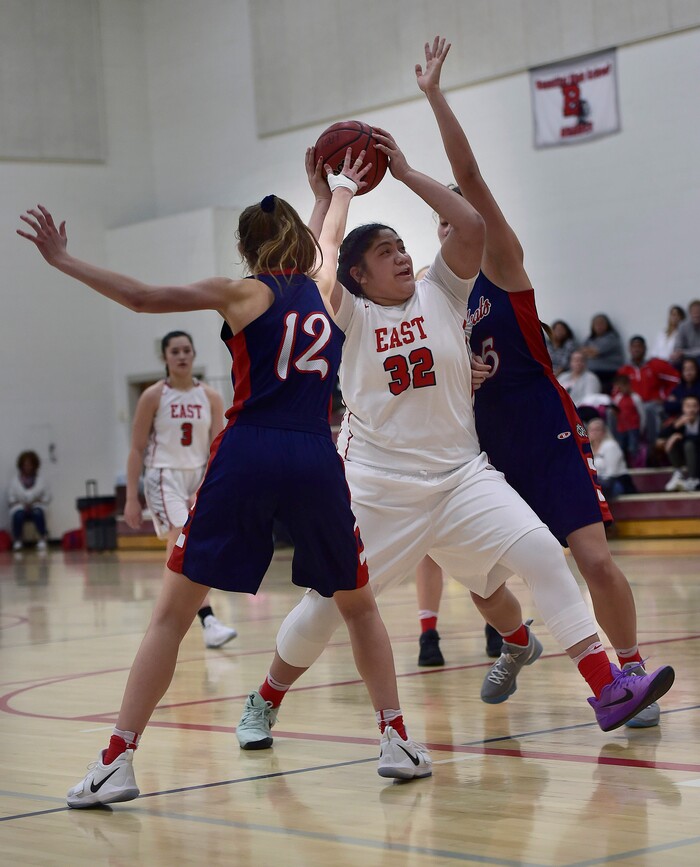 (Scott Sommerdorf   |  The Salt Lake Tribune)   East's Lani Taliauli makes a power move into the paint during second half play. East beat Woods Cross 50-36, Friday, December 15, 2017.  