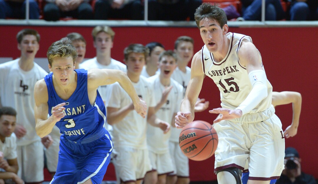 (Leah Hogsten  |  The Salt Lake Tribune) Lone Peak's Jaxon Pollard (15) makes the steal. Pleasant Grove plays Lone Peak to win the 6A High School BoysÕ Basketball Tournament Championship at the Jon M. Huntsman Center in Salt Lake City, Saturday, March 3, 2018. 