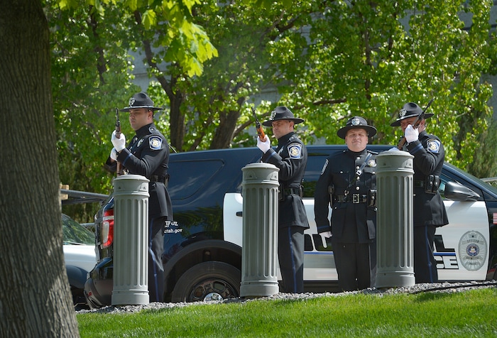 (Scott Sommerdorf | The Salt Lake Tribune)
The Utah Fraternal Ortder of Police Honor Guard fires the 21 gun salute during the Utah Law Enforcement Memorial to honor the 142 police officers killed in the line of duty during the state's history, Thursday, May 3, 2018.
No Utah law enforcement officer died in the line of duty last year.