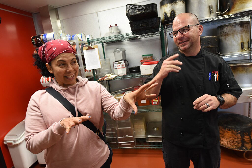 Francisco Kjolseth | The Salt Lake Tribune
Red Iguana owner Lucy Cardenas jokes around with kitchen manager Matthew Hewitt behind the scenes in their newly remodeled kitchen at Red Iguana 2. The popular eatery may be Utah's most decorated restaurant, winning both local and national awards for its "Killer Mexican Food."