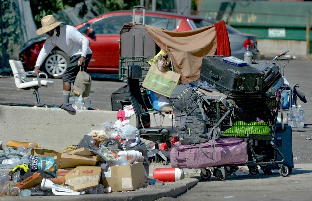 (Francisco Kjolseth | The Salt Lake Tribune) Homeless individuals camp out on the streets of downtown Salt Lake City on Wednesday, August 12, 2020. Racial minorities are more likely to face homelessness in Salt Lake County than white people are, a new analysis of homeless system data shows.