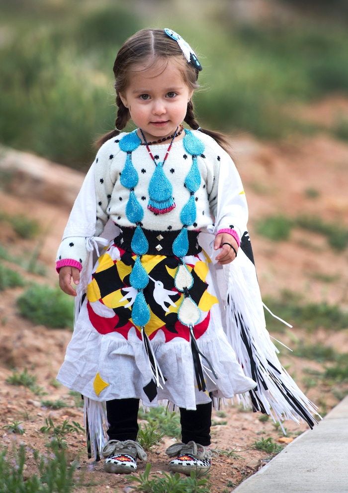 (Rick Egan  |  Tribune File Photo)  Aira Martineua, 2, wears her dancing regalia at the Parowan Gap, Wednesday, May 6, 2015.