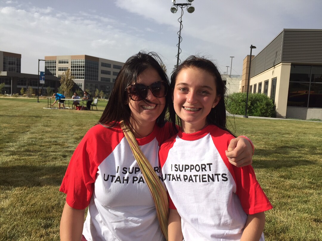 (The Salt Lake Tribune | Kathy Stephenson) Angie Rivera and her 14-year-old daughter, Faith Corbin, who has a brain tumor, were among several hundred Utahns who showed their support for Proposition 2 on Saturday.