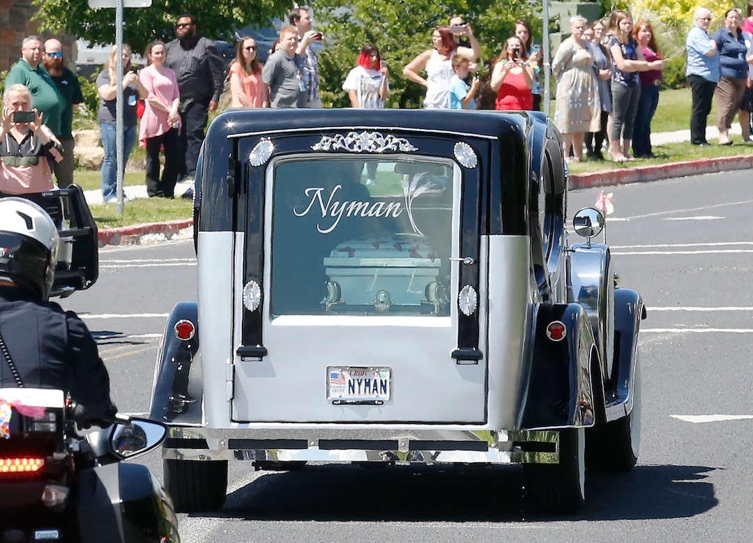 The hearse carries Elizabeth "Lizzy" Shelley, a 5-year-old girl who police say was taken from her home and killed by her uncle, during a funeral service Tuesday, June 4, 2019, in Logan, Utah. Her uncle, Alex Whipple, is charged with killing her after his sister let him spend the night at the family's home, prosecutors said. Elizabeth "Lizzy" Shelley disappeared May 25 and was found dead less than a block from her home after a five-day search. (AP Photo/Rick Bowmer)
