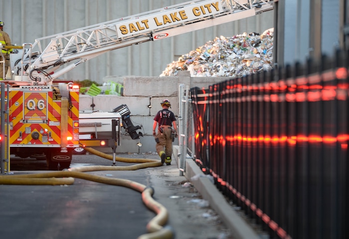 (Francisco Kjolseth  |  The Salt Lake Tribune) Fire crews respond to a fire at Rocky Mountain Recycling South Salt Lake on Saturday, July 11, 2020.