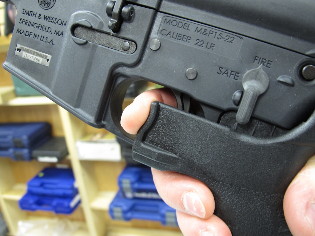 (Allen Breed | The Associated Press) In this Feb. 1, 2013, file photo, an employee of North Raleigh Guns demonstrates how a "bump" stock works at the Raleigh, N.C., shop. The gunman who unleashed hundreds of rounds of gunfire on a crowd of concertgoers in Las Vegas on Monday, Oct. 2, 2017, attached what is called a "bump-stock" to two of his weapons, in effect converting semiautomatic firearms into fully automatic ones.