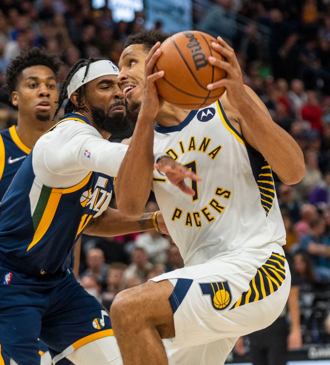 (Rick Egan | The Salt Lake Tribune) Utah Jazz guard Jordan Clarkson (00)tries to stop Indiana Pacers guard Malcolm Brogdon (7), as he takes the ball to the hoop, in NBA action between the Utah Jazz and the Indiana Pacers at Vivint Arena, on Thursday, Nov. 11, 2021.