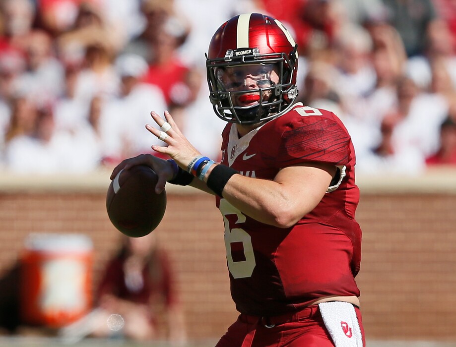 Oklahoma quarterback Baker Mayfield (6) looks for a receiver in the first quarter of an NCAA college football game against Iowa State in Norman, Okla., Saturday, Oct. 7, 2017. (AP Photo/Sue Ogrocki)