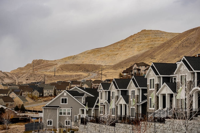 (Trent Nelson | The Salt Lake Tribune)
Homes at Traverse Ridge near a mining operation, Friday Nov. 23, 2018. The city of Lehi has sent a letter of assurance to residents saying there are no health risks from the gravel mining and construction on Point of the Mountain. They site a health department study showing the operation is not causing health-damaging air pollution. The health department tells a different story -- and they can't say there are no health risks from the mining.