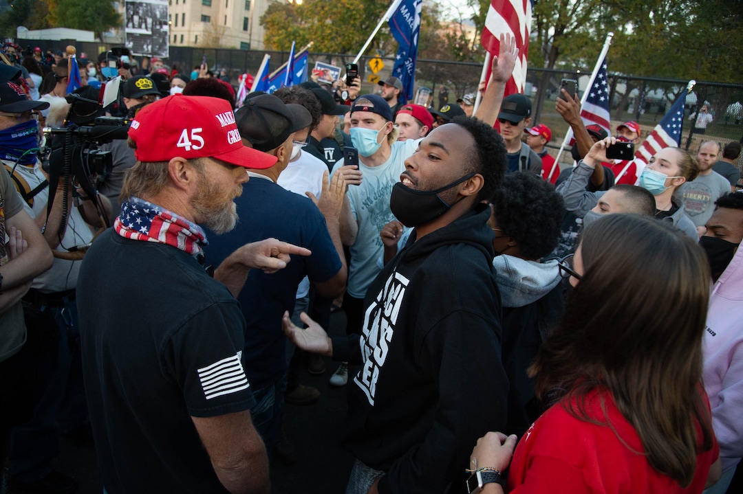 (Francisco Kjolseth  |  The Salt Lake Tribune) Supporters and counter protesters of President Donald Trump rally near Kingsbury Hall on the University of Utah campus in Salt Lake City on Wednesday, Oct. 7, 2020, during the vice presidential debate.