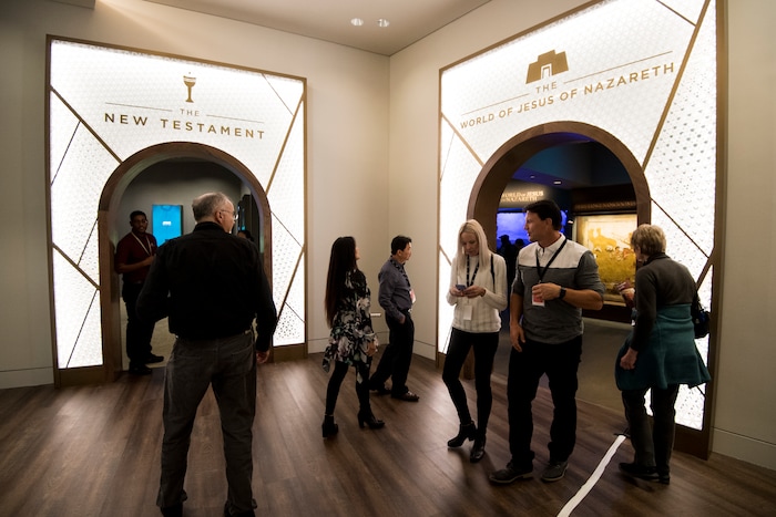 UNITED STATES - NOVEMBER 15: Visitors walk through the third floor exhibits in the Museum of the Bible on Wednesday, Nov. 15, 2017. (Photo By Bill Clark/CQ Roll Call) (CQ Roll Call via AP Images)