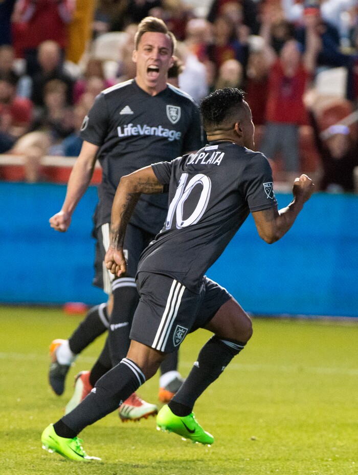 (Rick Egan  |  The Salt Lake Tribune) 
  Real forward Corey Baird (27) celebrates as Real Salt Lake forward Joao Plata (10) scores a goal for Salt Lake, in MLS soccer action, between Real Salt Lake and Colorado Rapids,  at Rio Tinto Stadium, Saturday, April 21, 2018.


