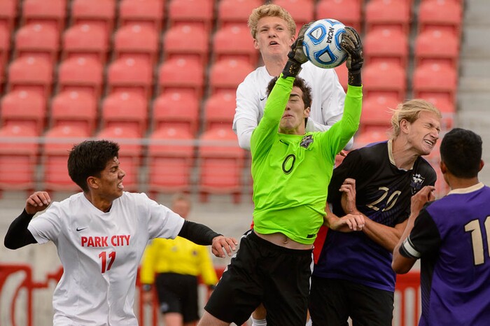 (Trent Nelson | The Salt Lake Tribune)  Desert Hills goalkeeper Preston Hodges grabs the ball in the 4A state championship game vs. Park City High School, Saturday May 12, 2018.