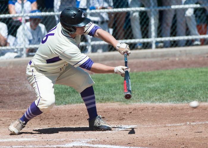(Rick Egan  |  The Salt Lake Tribune)   Riverton's Nate Hamblin lays down a bunt for the Silverwolves, in 6A state baseball championship action between Riverton and Bingham, at UVU in Orem, Friday, May 25, 2018.