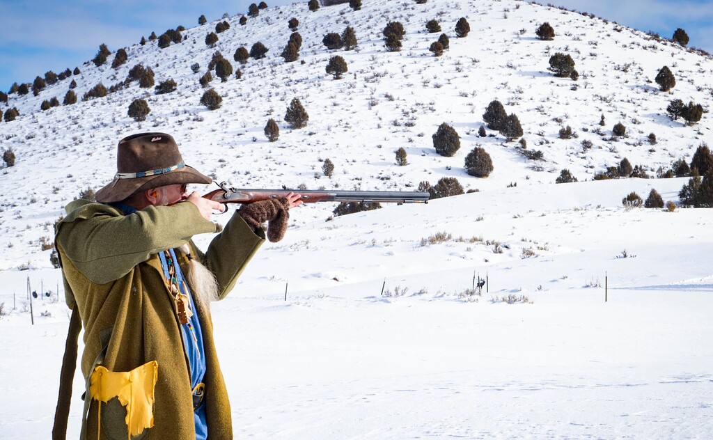 (Jackson Wilde | The Herald Journal via AP) In this Saturday, Jan. 18, 2020 photo, Dave Winters shoots his muzzleloader at the Willy Wapiti's Smoke Pole Biathlon on at Hardware Ranch, near Hyrum, Utah