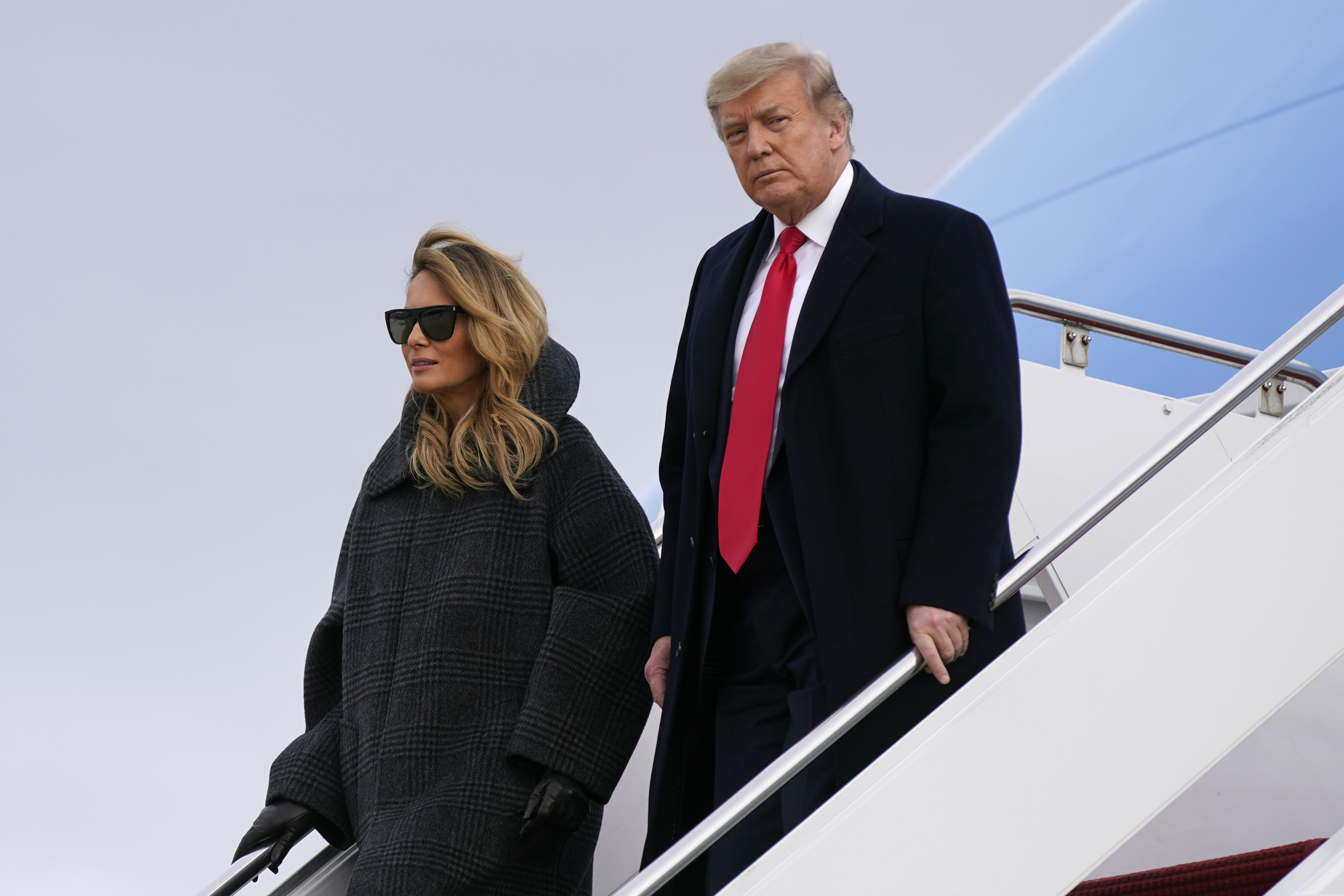 (Patrick Semansky | AP photo)

President Donald Trump and first lady Melania Trump step off Air Force One at Andrews Air Force Base, Md., Thursday, Dec. 31, 2020. Trump is returning to Washington after visiting his Mar-a-Lago resort.