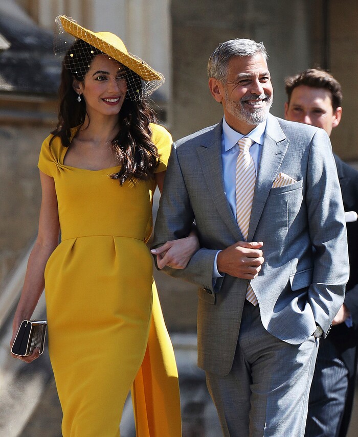 Amal Clooney and George Clooney arrive for the wedding of Prince Harry to Meghan Markle, at St. George's Chapel in Windsor Castle in Windsor, near London, England, Saturday, May 19, 2018. (Chris Jackson/pool photo via AP)