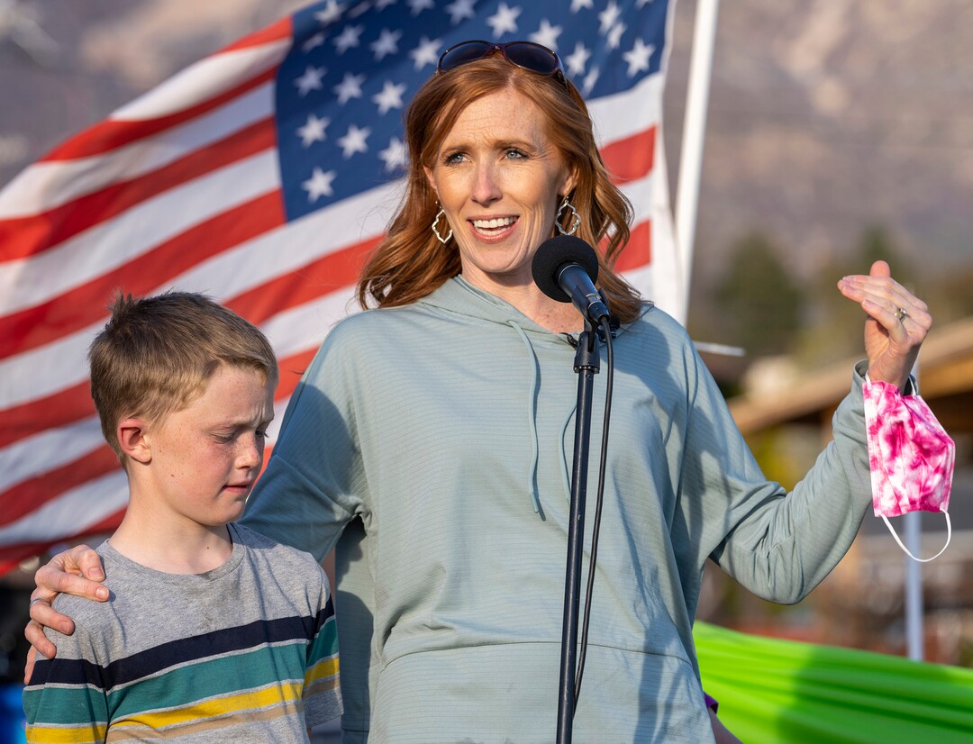 (Rick Egan | The Salt Lake Tribune)  Jennie Taylor stands with her son Jacob as she says a few words, during the Earth Day Party at the Mini Taylor farm at at the Jennie Taylor's residence, in North Ogden. Taylor is the widow to the late Major. Brent Taylor, killed in 2018 while on Army National Guard duty in Afghanistan, donations have helped restore the small family farm, with planter boxes, a chicken coop, and a sandbox for the kids, on Thursday, April 22, 2021.