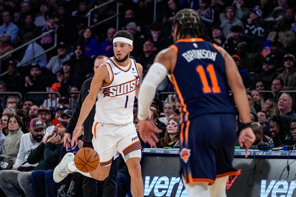(Peter K. Afriyie | AP) Phoenix Suns guard Devin Booker (1) advances the ball during the first half of an NBA basketball game against the New York Knicks in New York, Sunday, Nov. 26, 2023.