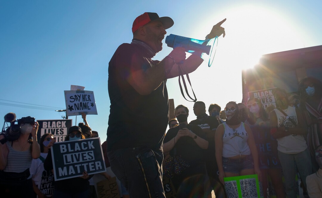 (Leah Hogsten  |  The Salt Lake Tribune) Five days after after nine protesters were arrested during a peaceful rally in memory of Zane James that turned into a violent clash with Cottonwood Heights officers, demonstrators gathered outside the police station Friday to denounce CHPD's actions and its officers for inciting the violence.