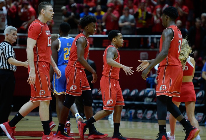 (Francisco Kjolseth  |  The Salt Lake Tribune)  Utah Utes guard Justin Bibbins (1) celebrates a play with his teammates as the University of Utah hosts UCLA in NCAA basketball at the Huntsman Center in Salt Lake City, Thursday, Feb. 22, 2018.