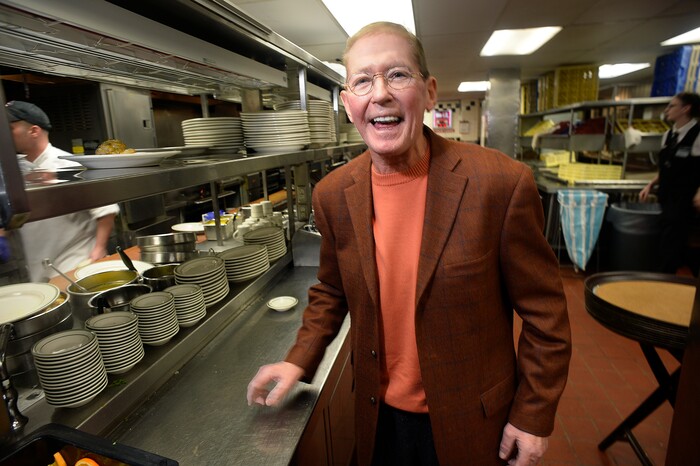 Scott Sommerdorf | The Salt Lake Tribune
Tom Guinney visits the kitchen at Market Street Grill in downtown Salt Lake City on Jan. 12, 2017. Guinney joined the Gastronomy restaurant group in 1980, two years after original co-founders John Williams and Tom Sieg opened the New Yorker. Guinney died Sept. 6, 2019, at his daughter’s home in Oregon City, Ore. Guinney was 71.
