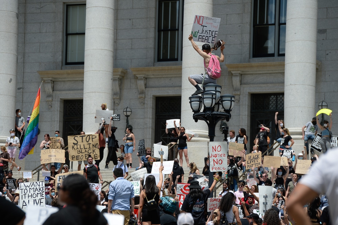 (Francisco Kjolseth  |  The Salt Lake Tribune) Hundreds march from the Salt Lake City Police Department to the State Capitol on Saturday, May 30, 2020.