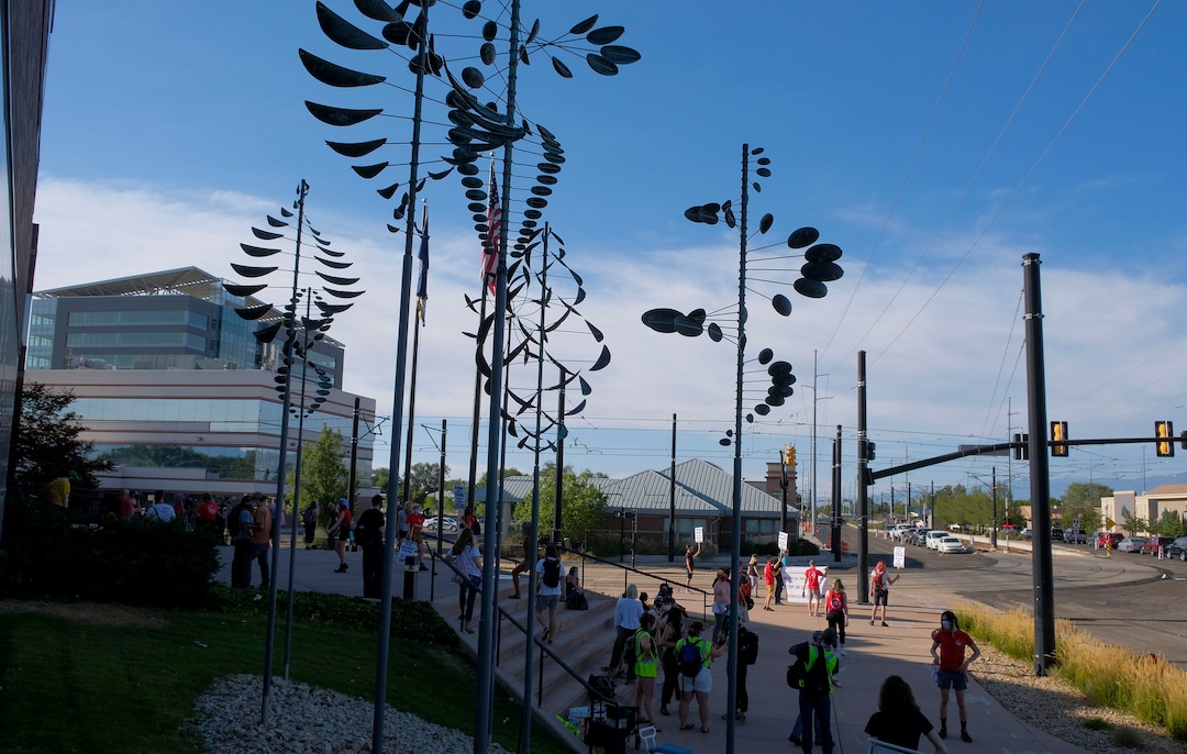 (Leah Hogsten  |  The Salt Lake Tribune) About 75 people rallied for the People's Council to defund the West Valley Police Department outside West Valley City Hall, Aug.8, 2020.  Saturday's rally was hosted by the Salt Lake chapter of the Party for Socialism and Liberation.