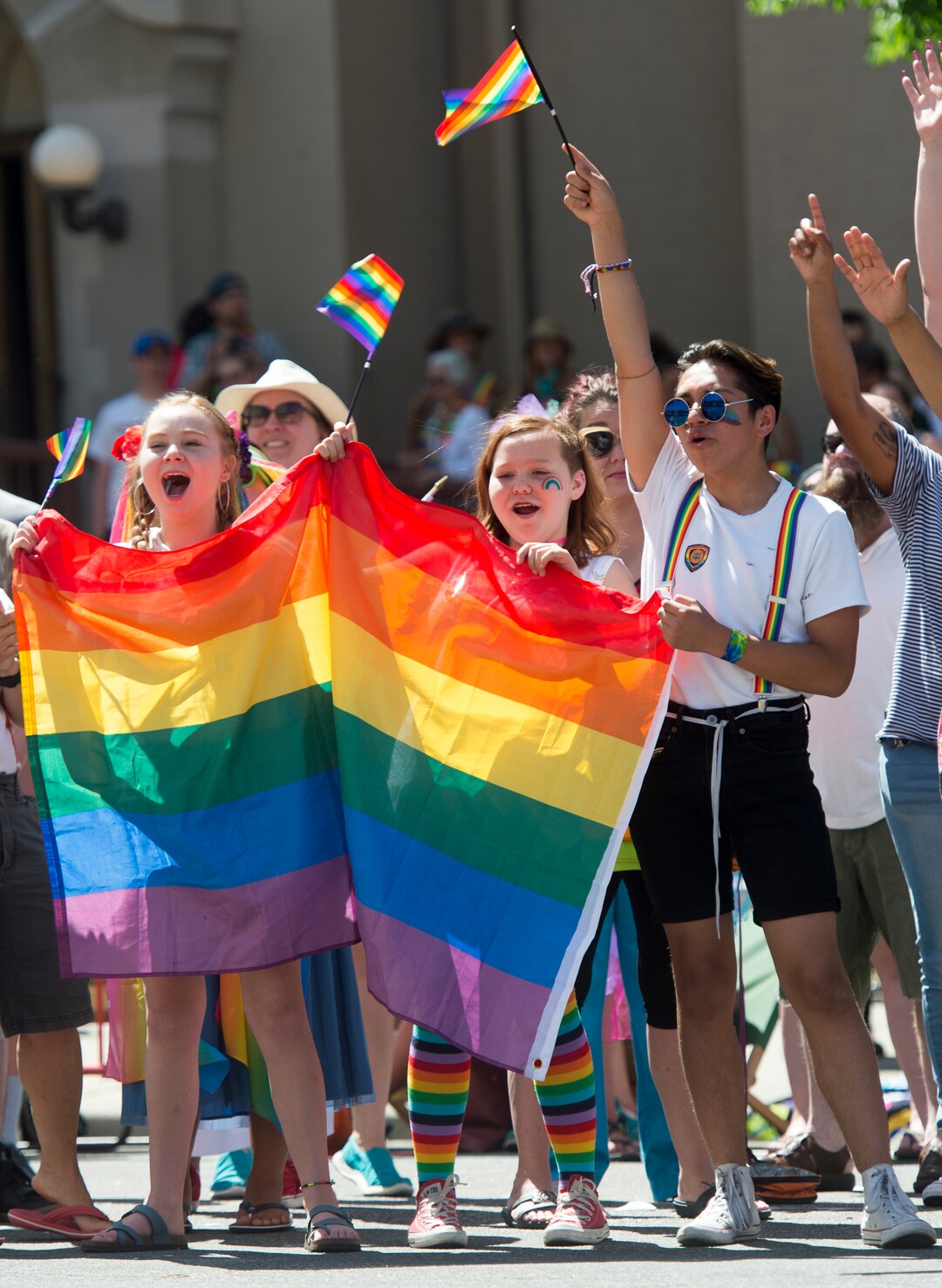 (Rick Egan  |  The Salt Lake Tribune)   Parade goers cheer as the Utah Pride Parade marches up 200 South in Salt Lake City, Sunday, June 3, 2018.