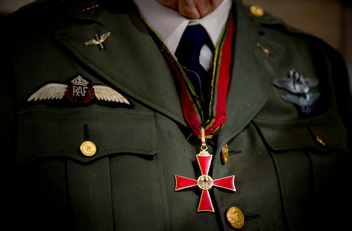 (Isaac Hale | The Daily Herald via AP) Accolades from Gail Halvorsen 's military career adorn his uniform as he poses for a portrait at his son's home in Midway, on Wednesday, Oct. 7, 2020. Air Force Colonel (retired) Gail S. Halvorsen changed the course of history with just two pieces of gum. Now has made a bit of his own history. Halvorsen turned 100 years old this month.