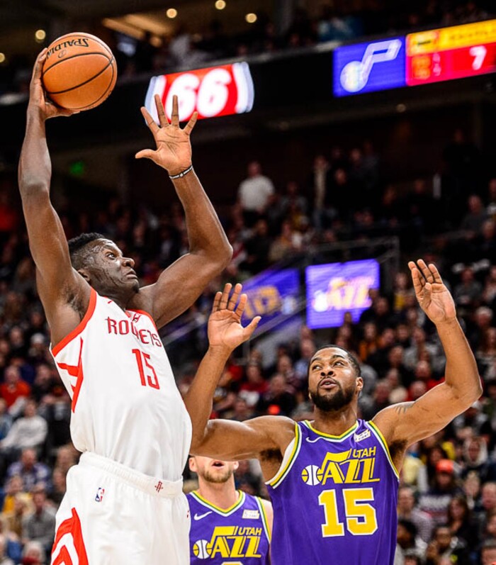 (Trent Nelson | The Salt Lake Tribune)  
Houston Rockets center Clint Capela (15) shoots over Utah Jazz forward Derrick Favors (15). The Utah Jazz host the Houston Rockets, NBA basketball in Salt Lake City on Thursday Dec. 6, 2018.