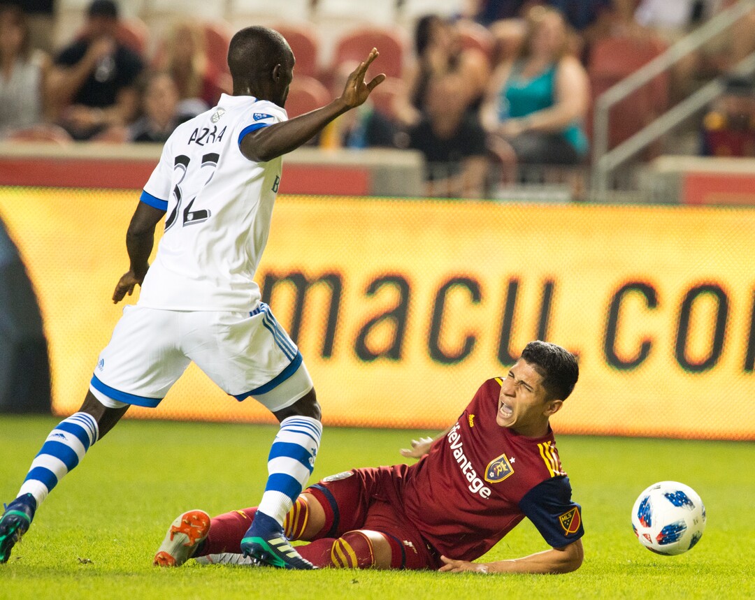 (Rick Egan  |  The Salt Lake Tribune)     Real Salt Lake forward Jefferson Savarino (7) collides with Montreal Impact midfielder Micheal Azira (32), in MLS action between Real Salt Lake and Montreal Impact, at Rio Tinto Stadium in Sandy, Saturday, Aug. 11, 2018.
