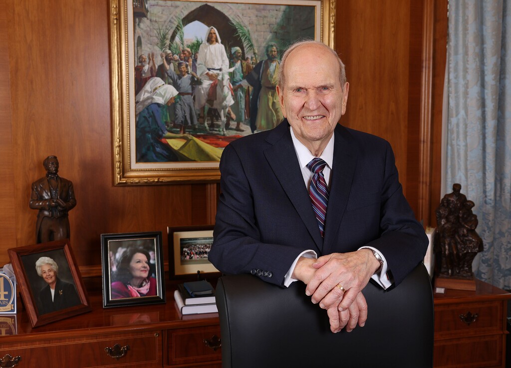 (The Church of Jesus Christ of Latter-day Saints)
President Russell M. Nelson smiles at his office in the Church Administration Building in Salt Lake City on April 13, 2022. The church leader urges people to do more than offer "thoughts and prayers" in the wake of tragedy by looking for ways to help those in need.