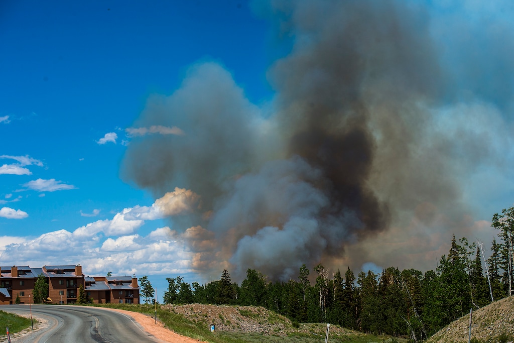 Chris Detrick  |  The Salt Lake Tribune
Smoke rises from the wildfire burning north of the southern Utah ski town of Brian Head Tuesday, June 20, 2017. The Brian Head Fire forced the evacuation of about 750 residents and visitors on Saturday.