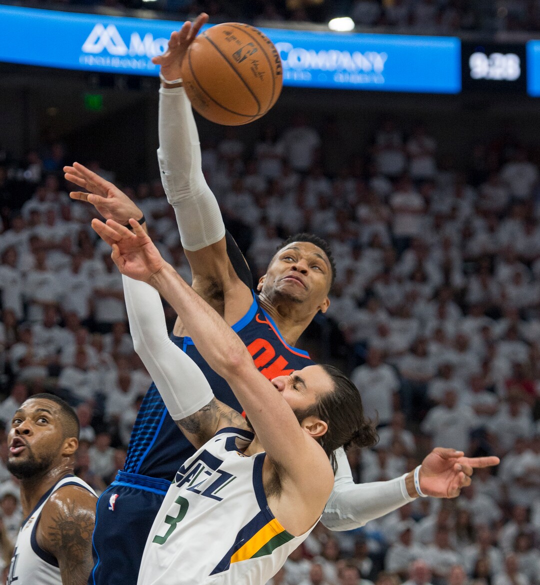 (Rick Egan  |  The Salt Lake Tribune)    Utah Jazz guard Ricky Rubio (3) is fouled by Oklahoma City Thunder guard Russell Westbrook (0), in game 4, NBA playoff action between Utah Jazz and Oklahoma City Thunder, in Salt Lake City, Monday April 23, 2018.