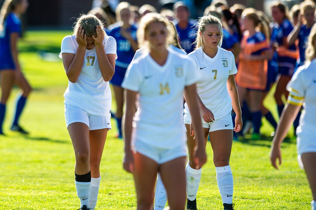 (Chris Detrick  |  The Salt Lake Tribune)  Davis' Olivia Romney (17) and Davis' Riley Whitesides (7) walk off of the field after the game at Angel Street Soccer Complex in Kaysville Thursday, August 24, 2017. Fremont defeated Davis 5-4 in double overtime.