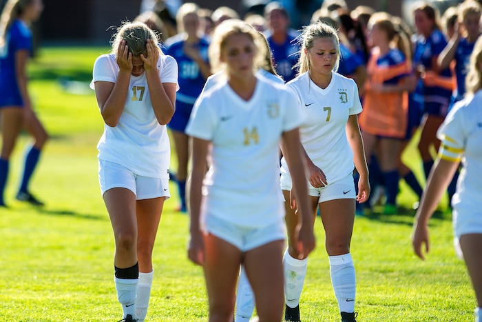 (Chris Detrick | The Salt Lake Tribune) Davis' Olivia Romney (17) and Davis' Riley Whitesides (7) walk off of the field after the game at Angel Street Soccer Complex in Kaysville Thursday, August 24, 2017. Fremont defeated Davis 5-4 in double overtime.