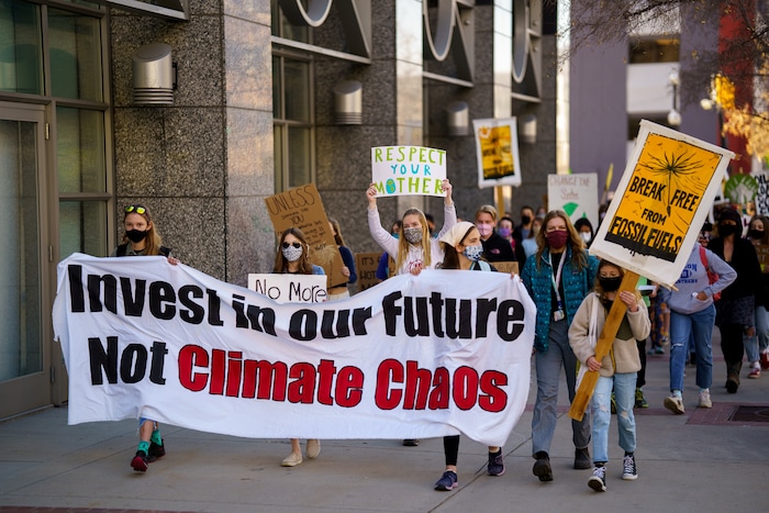 (Trent Nelson | The Salt Lake Tribune) Students march to the state Capitol in Salt Lake City to protest inaction on the climate crisis on Friday, March 19, 2021.