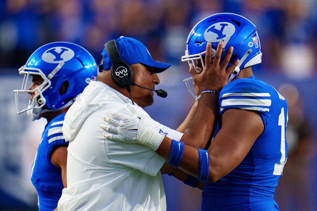 (Trent Nelson | The Salt Lake Tribune) Kalani Sitake and Brigham Young Cougars defensive end Isaiah Bagnah (13) as BYU hosts Southern Illinois, NCAA football in Provo on Saturday, Aug. 31, 2024.