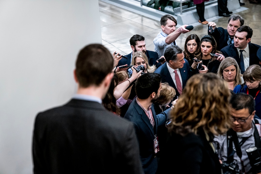 (Anna Moneymaker | The New York Times) Sen. Mitt Romney (R-Utah) speaks to reporters while walking to the Senate floor for the continuation of the Senate impeachment trial of President Donald Trump in Washington on Monday, Jan. 27, 2020. Romney is the only Republican senator calling for witnesses in the impeachment trial. His GOP colleagues are taking shots: One branded him “Jeff Flake on steroids.”