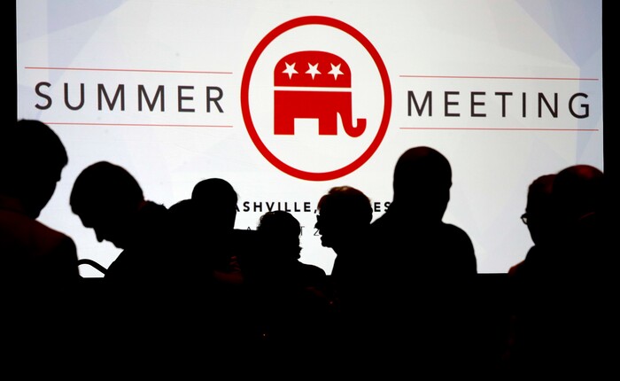 People talk before the start of the meeting of the standing committee on rules at the Republican National Committee summer meeting, Thursday, Aug. 24, 2017, in Nashville, Tenn. (AP Photo/Mark Humphrey)