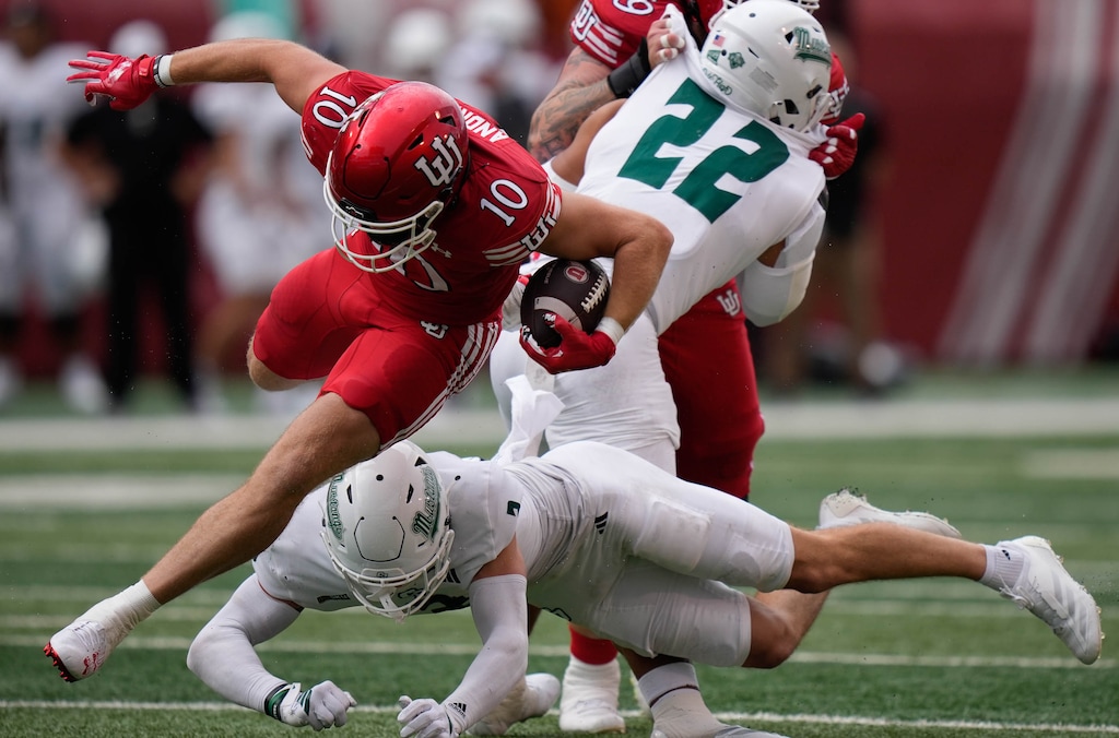 (Francisco Kjolseth | The Salt Lake Tribune) Utah Utes tight end Hunter Andrews (10) goes down as Utah hosts Cal Poly, NCAA football in Salt Lake City on Saturday, Sept. 6, 2025.